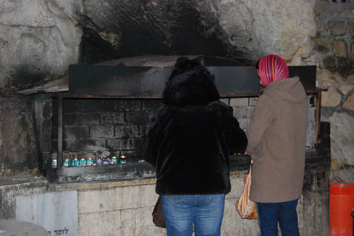 Yard in front of Elijah's cave, and a stand for candles.