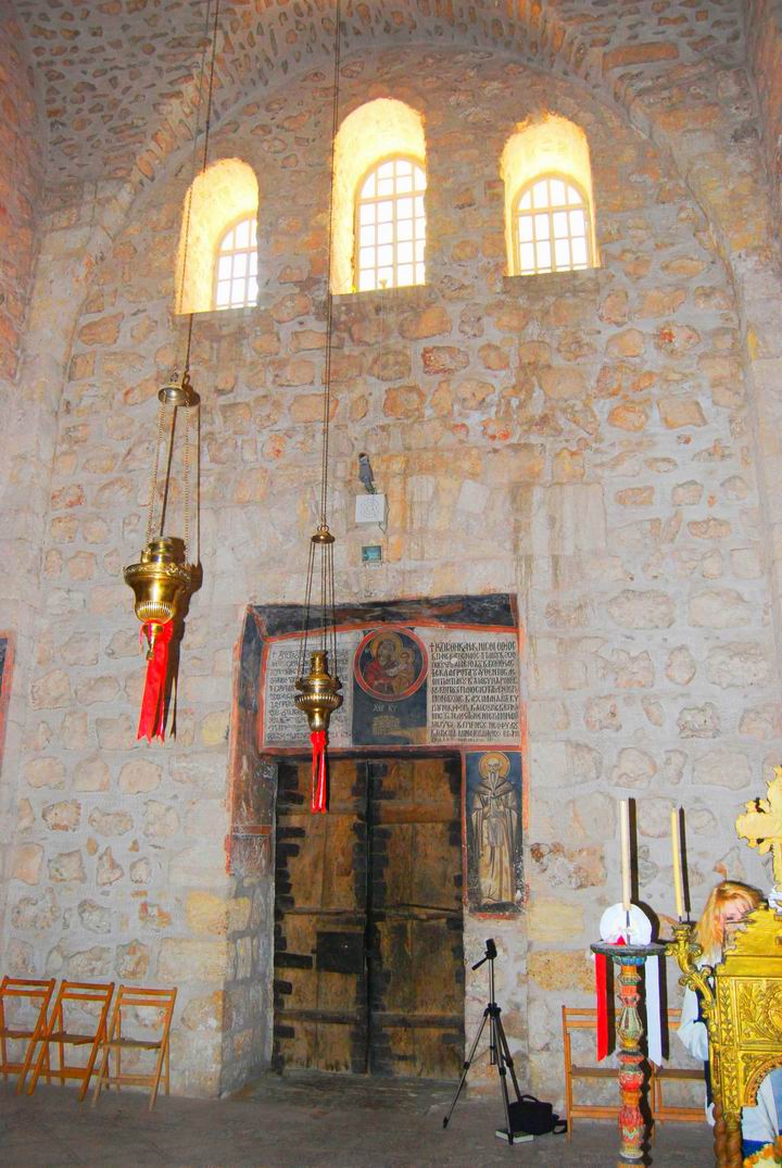 Western side and door of the church