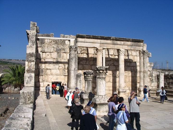 Stone benches along the western wall of the 4thC synagogue in Capernaum.