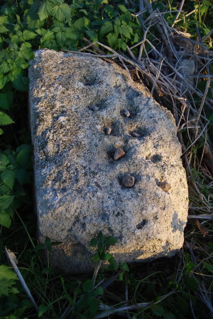 Ancient game stone, near the ruined mosque of Damun