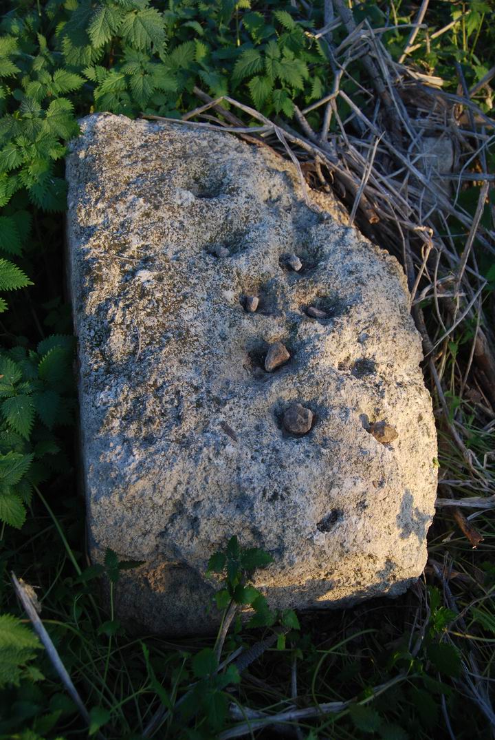 Ancient game stone, near the ruined mosque of Damun