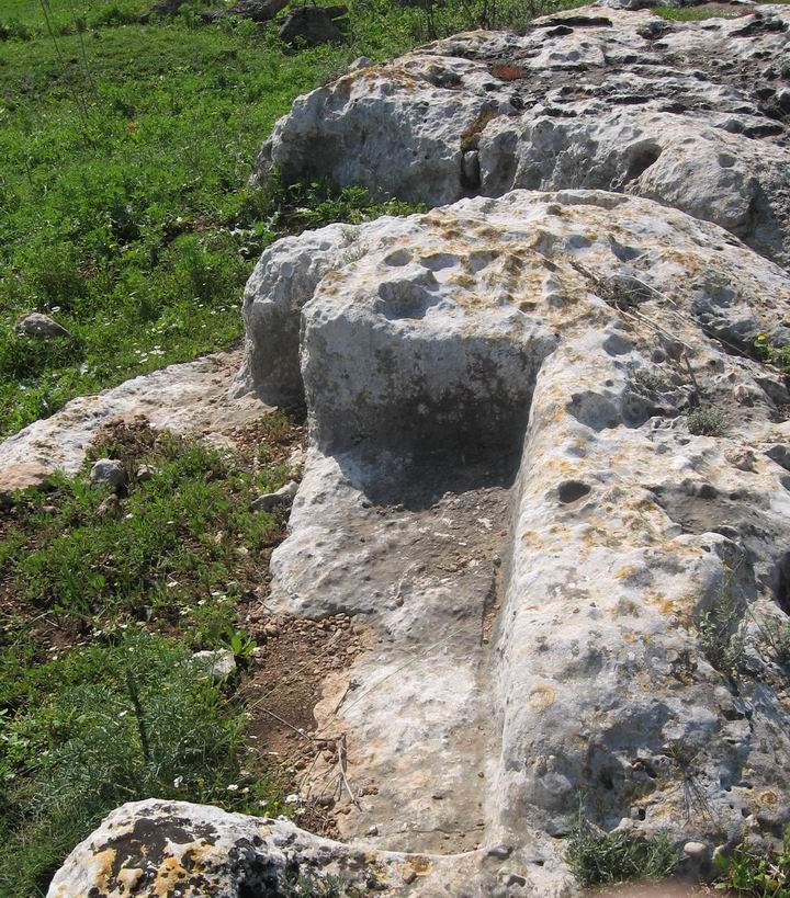 Installations and rock-cuttings on the slope of the hill west to Khibet Sharta.