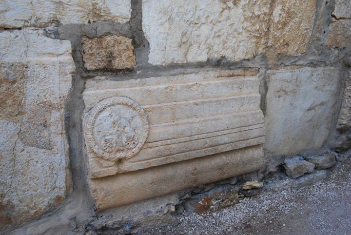 Lintel reused in the wall near Hulda Gates