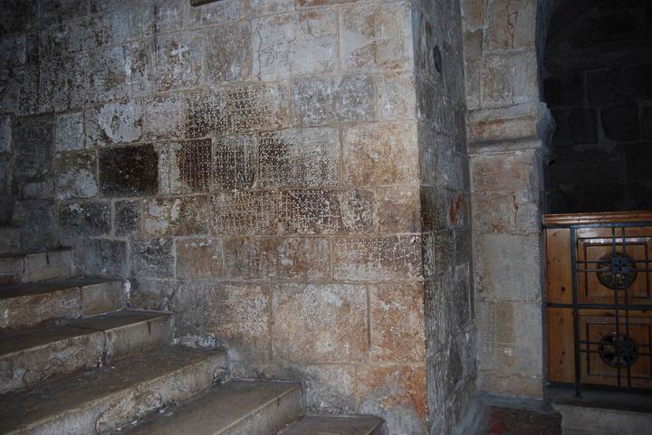 Steps on the way down to St Helen chapel, with ancient graffiti.